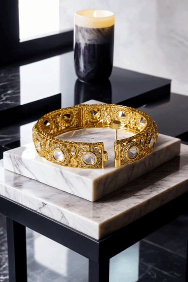 Tamina Moissanite Polki Bangles - Heritage Style | Openable single bangle open on marble, emphasizing the secure clasp and ornate design.