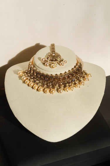 Antique gold choker necklace set with matching maang tikka