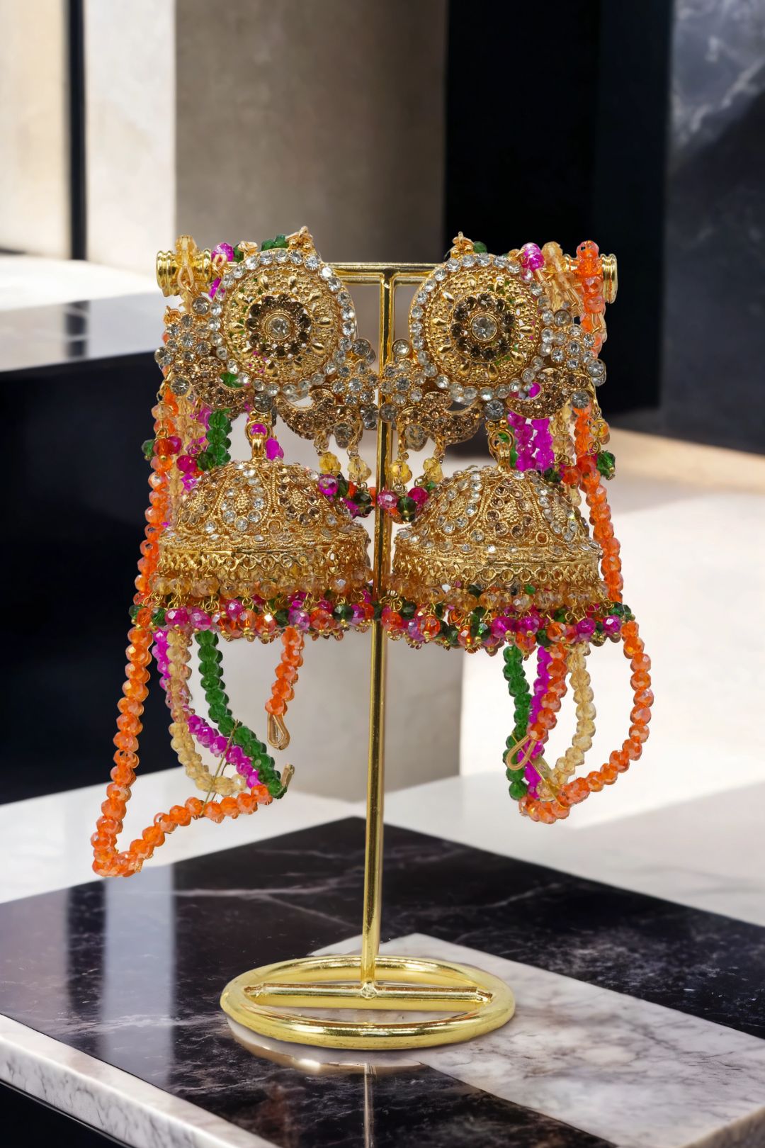 Close-up of gold Namar Choker Necklace Set earrings with vibrant beads, ideal for festive and bridal wear.