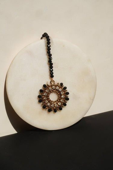 Roza Zircon Maang Tikka on marble