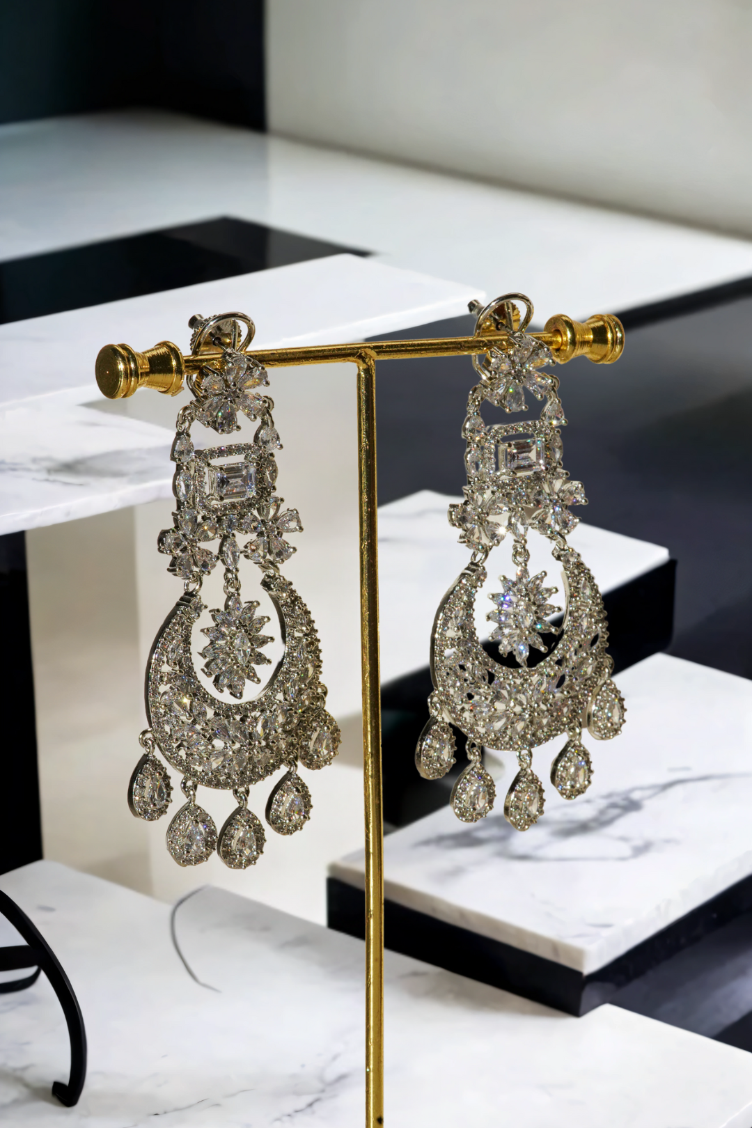 Samina chandelier earrings, rhodium-plated, white pavé stones, crescent design with teardrop charms, Indian jewelry