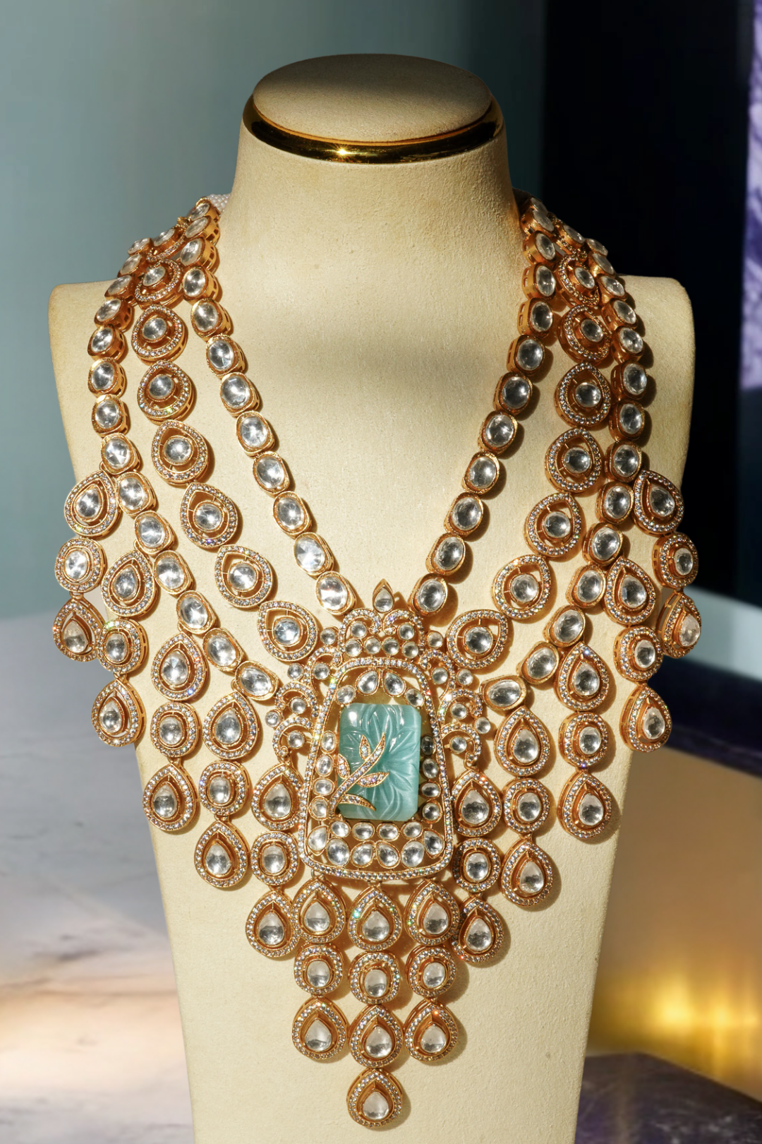 Siham Indian bridal jewelry set with moissanite polki stones, gold plating, turquoise centerpiece, and green accents