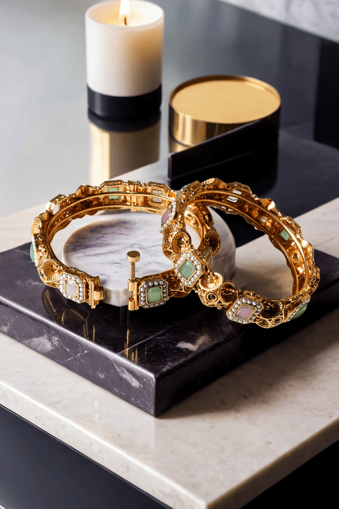 Set of matte gold South Asian bangles with pastel stones and faux pearl detailing from Inaury