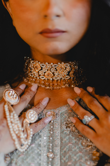 Close-up of Ayesha Choker Necklace highlighting intricate floral craftsmanship and sparkling stones, perfect for weddings or Eid.
