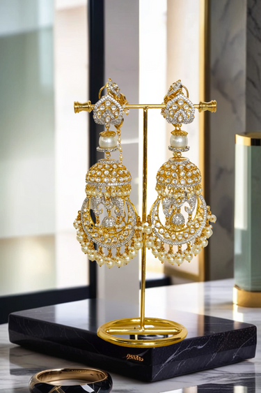 Gold-plated kundan jhumka earrings with sculpted bird motif and pearl danglings – Inaury.com