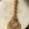 Close Up of Gold-Plated Multicolor AD Maang Tikka with Light Pink and White Stones