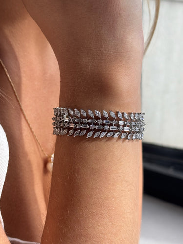 Ariana gold or rhodium plated AD stone bangle bracelet with diamante accents from Inaury