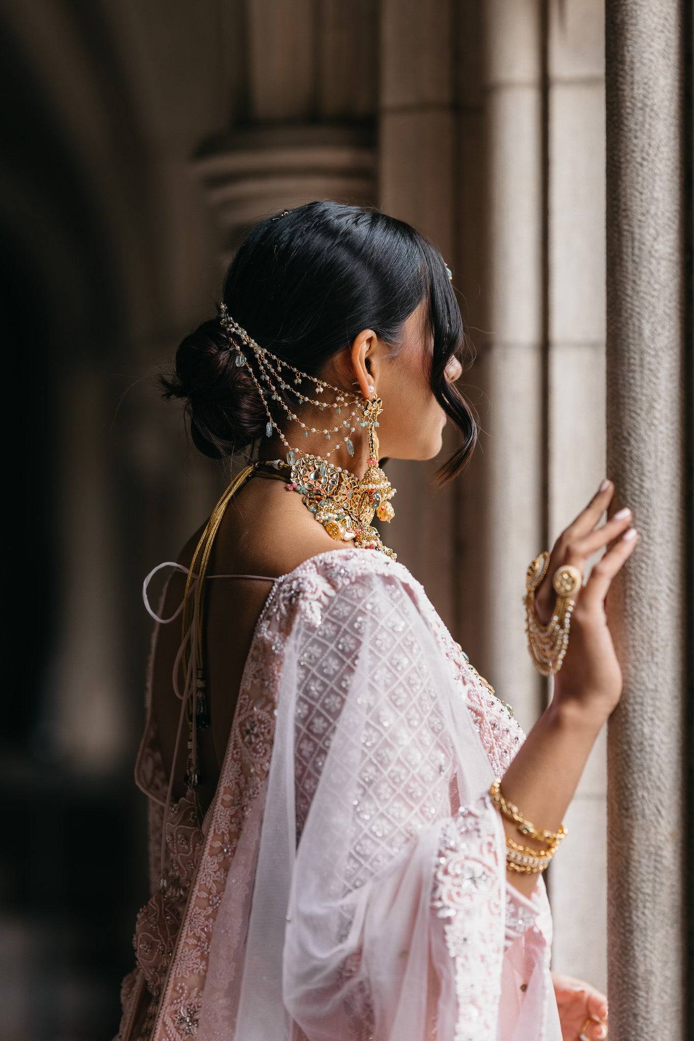 Arthi Bridal Set - Gold-plated with Polki, Kundan, and Meenakari work, featuring an oversized choker necklace, layered long necklace, matching earrings, and Maang Tikka.