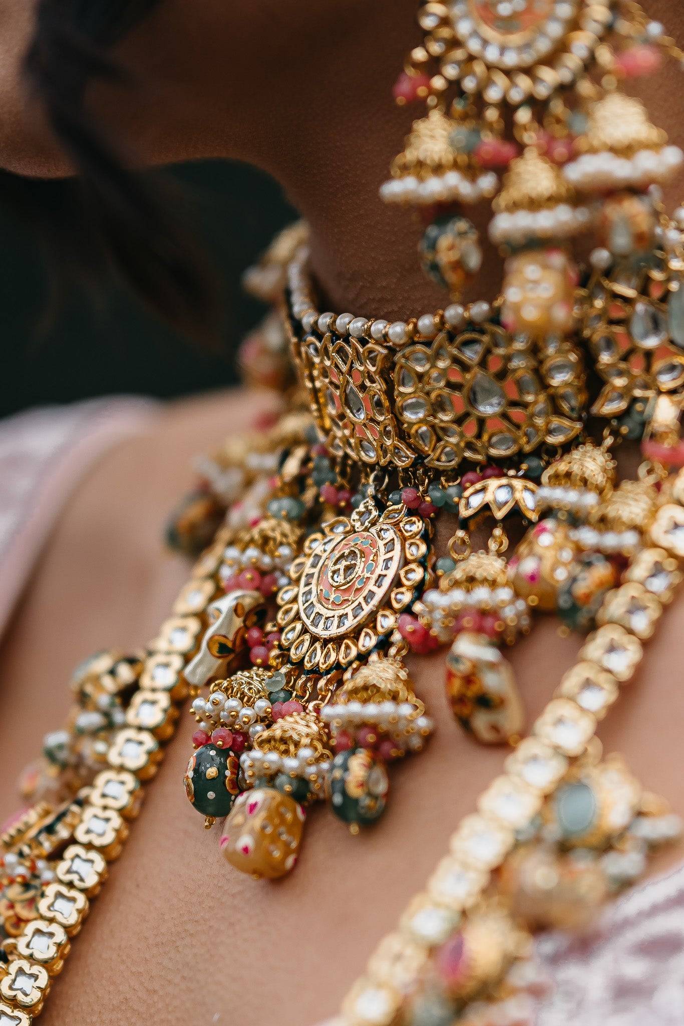 Arthi Bridal Set - Gold-plated with Polki, Kundan, and Meenakari work, featuring an oversized choker necklace, layered long necklace, matching earrings, and Maang Tikka.