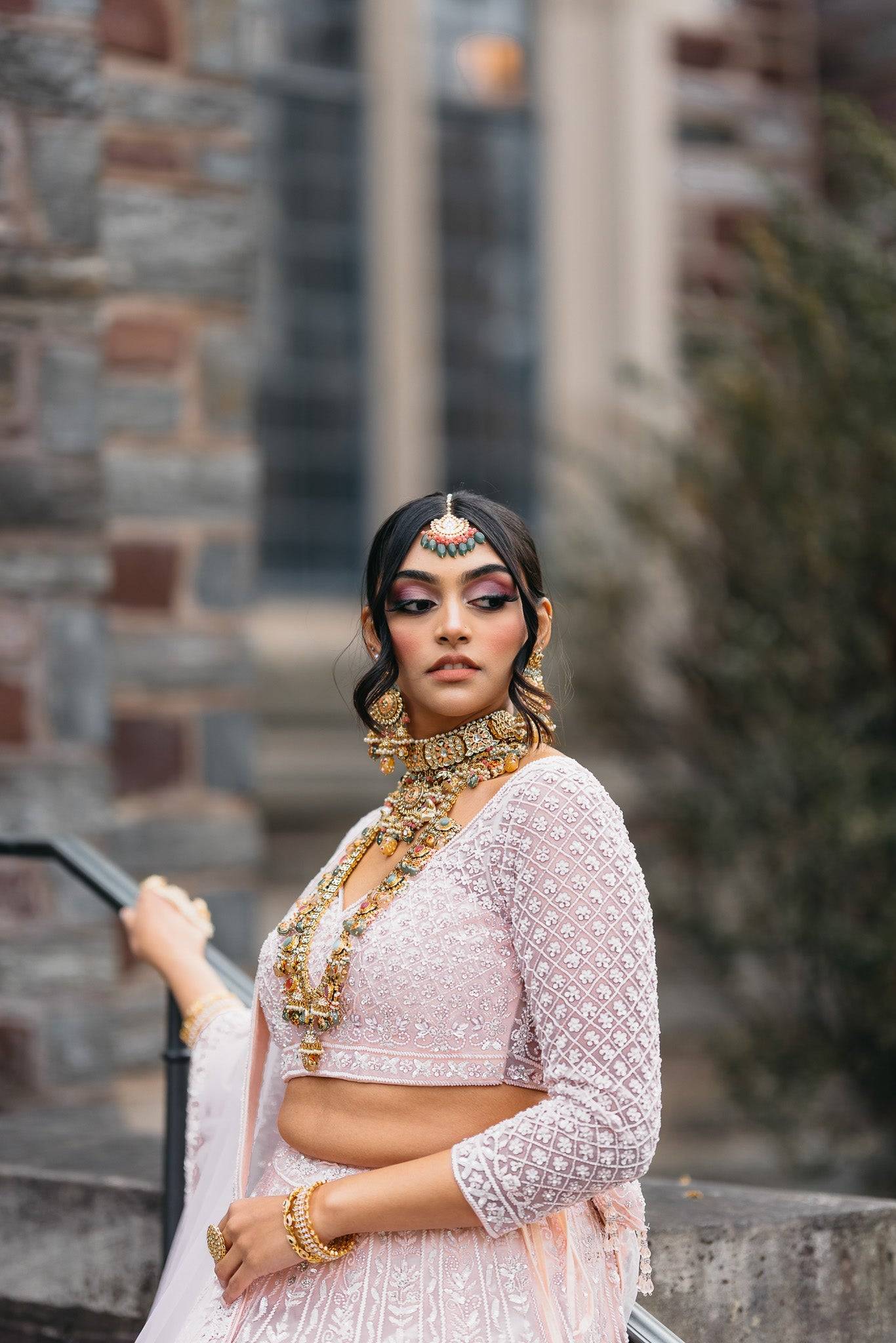 Arthi Bridal Set - Gold-plated with Polki, Kundan, and Meenakari work, featuring an oversized choker necklace, layered long necklace, matching earrings, and Maang Tikka.