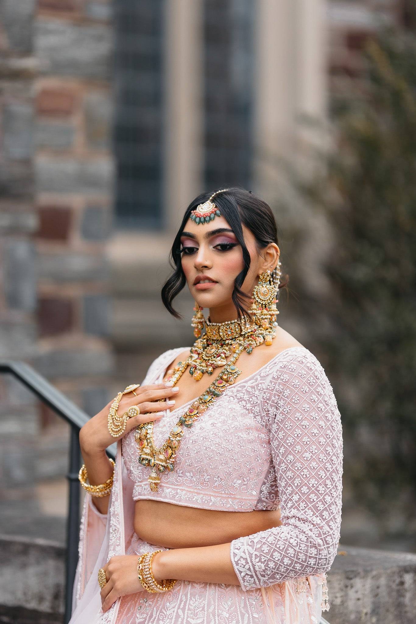 Arthi Bridal Set - Gold-plated with Polki, Kundan, and Meenakari work, featuring an oversized choker necklace, layered long necklace, matching earrings, and Maang Tikka.