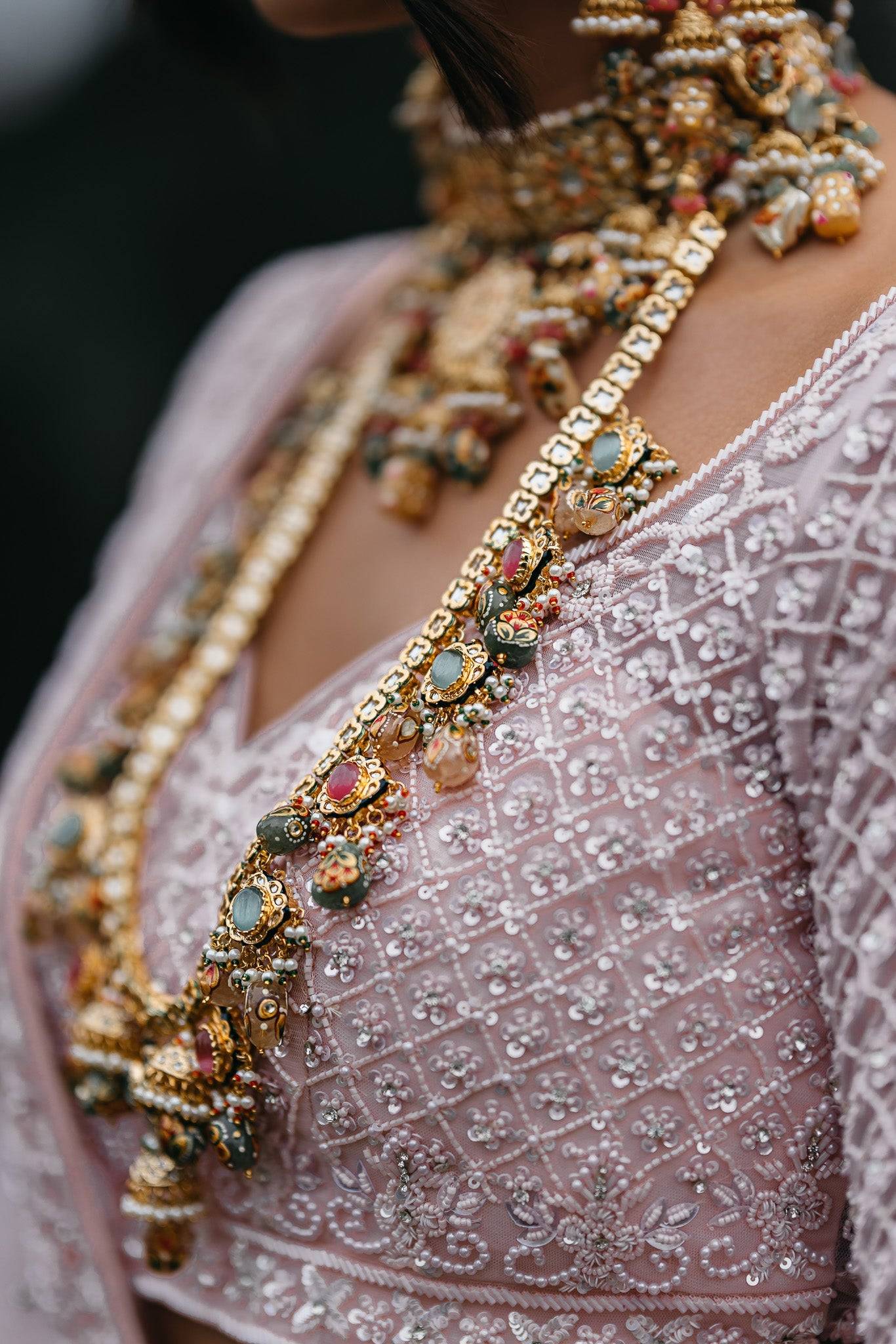 Arthi Bridal Set - Gold-plated with Polki, Kundan, and Meenakari work, featuring an oversized choker necklace, layered long necklace, matching earrings, and Maang Tikka.