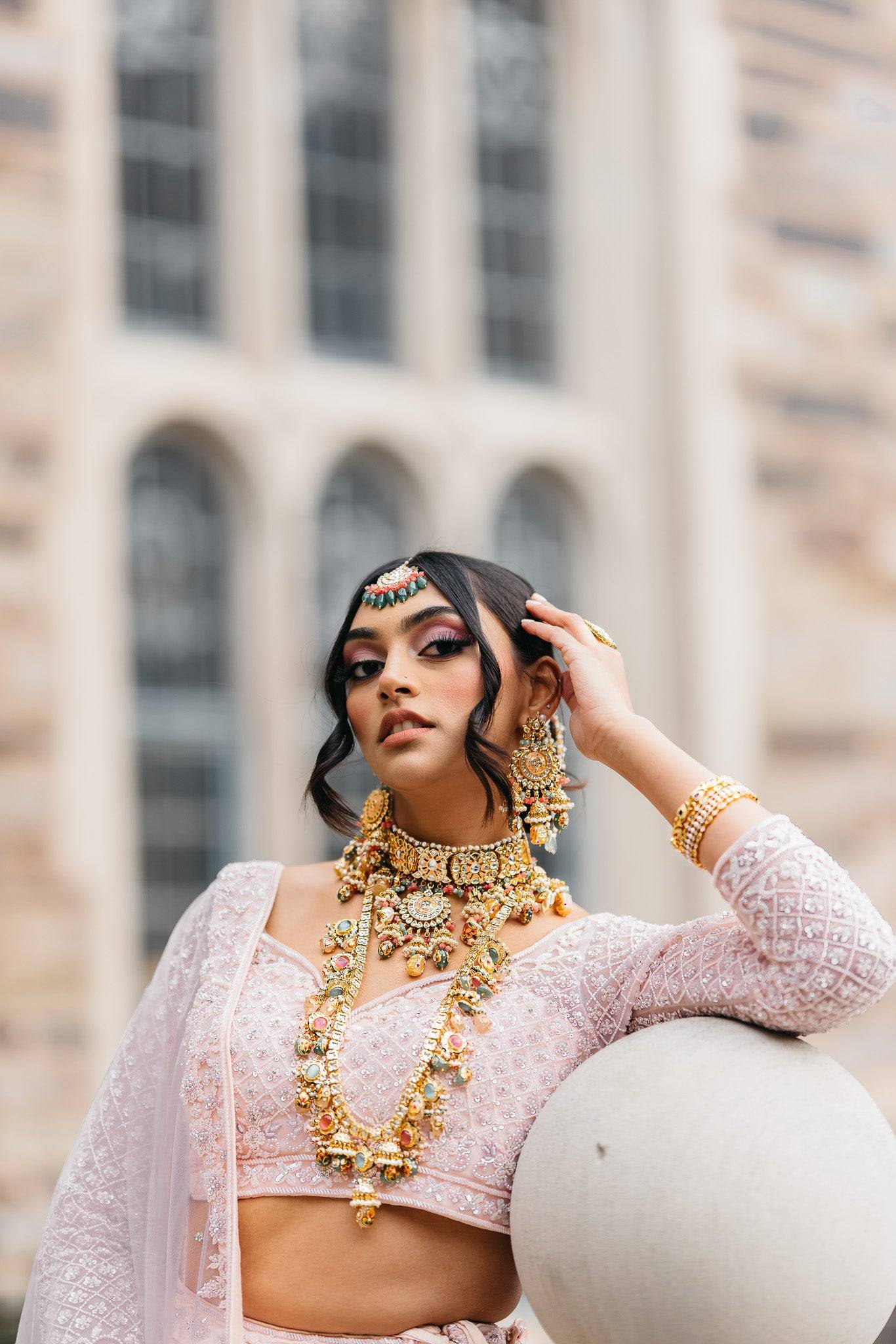 Arthi Bridal Set - Gold-plated with Polki, Kundan, and Meenakari work, featuring an oversized choker necklace, layered long necklace, matching earrings, and Maang Tikka.
