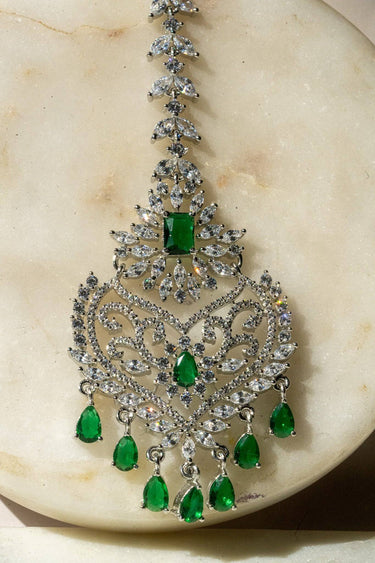 Close-Up of Rhodium-Plated Multicolor AD Maang Tikka with Green and White Stones