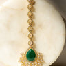 Gold-plated maang tikka with matte green teardrop center and white AD stones from Inaury