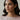 Amore American Diamond Maang Tikka in light pink worn by a female model showing a modern South Asian wedding guest hairstyle.