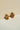 A studio pair view of the Dilara gold-plated cluster stud earrings featuring clear heart-cut Kundan stones arranged in an elegant geometric clover layout.