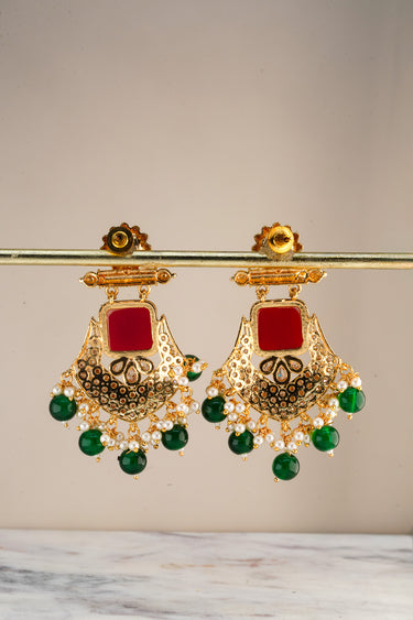 The reverse technical layout of the Kavya gold-plated statement earrings showcasing the smooth high-polish metal backing and secure push-back post structure.
