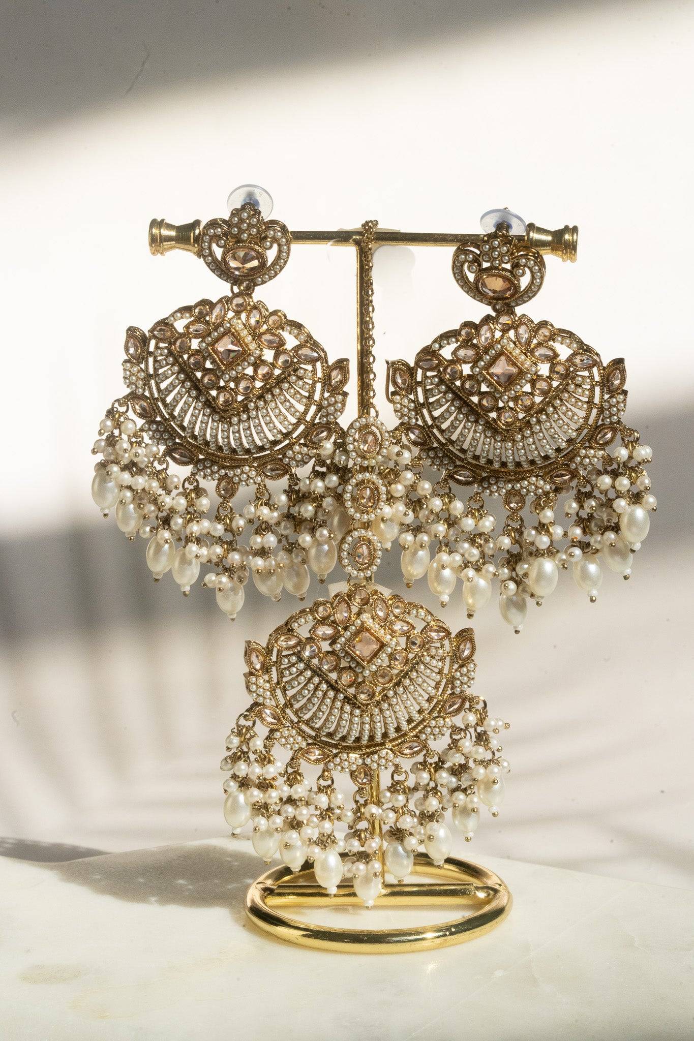 Statement mehendi gold chandbali earrings and tikka set with pearl drops