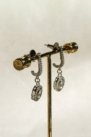 The rear structural design and smooth hinge lock mechanism of the Sania Kundan hoop earrings.