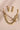 Gold-plated Kundan pearl necklace set with two pearl strands, round stones and matching drop earrings.