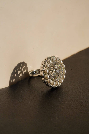 Asal rhodium plated pearl dome ring angled view showing open filigree design and faux pearl detail handcrafted South Asian jewelr