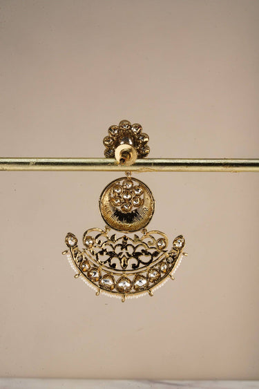 Back view of Inaury Saleena Kundan Chandbali Drop Earrings on gold stand — showing earring back, push-back closure, and reverse of filigree crescent