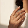 South Asian woman wearing Talia rhodium plated AD lattice band ring showing open grid stone pattern Inaury contemporary desi jewelry