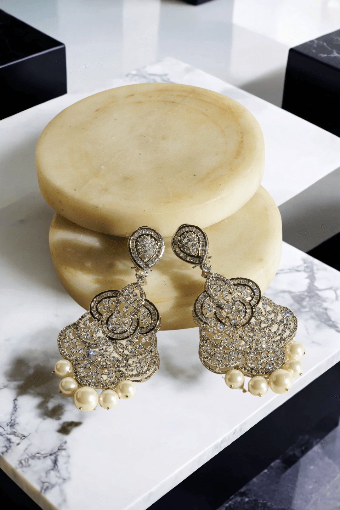 Irene Radiant Pearl Drop Earrings, rhodium-plated with intricate filigree design, pavé white stones, and pearl drops, 3.4 inches long - Indian jewelry for festive and wedding occasions.