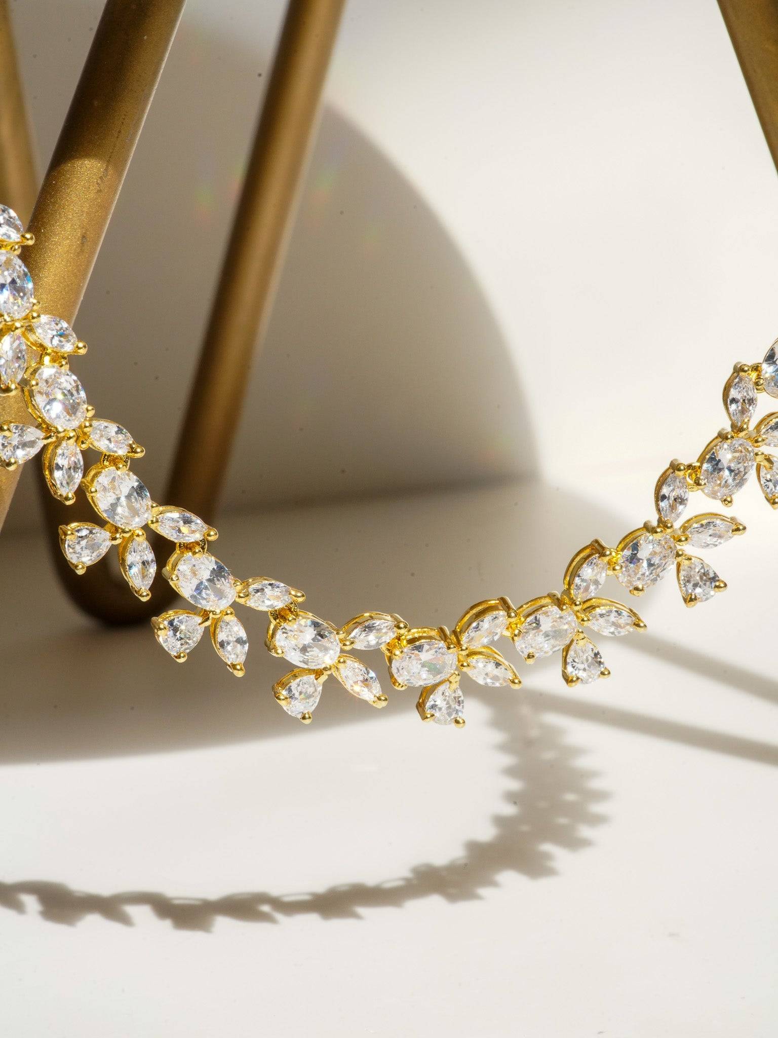 Lama Single Layer Long Diamante Accent AD Necklace Set in rhodium-plated silver or gold finish with intricate floral pattern and matching dangling earrings.