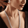 Lama Single Layer Long Diamante Accent AD Necklace Set in rhodium-plated silver or gold finish with intricate floral pattern and matching dangling earrings.