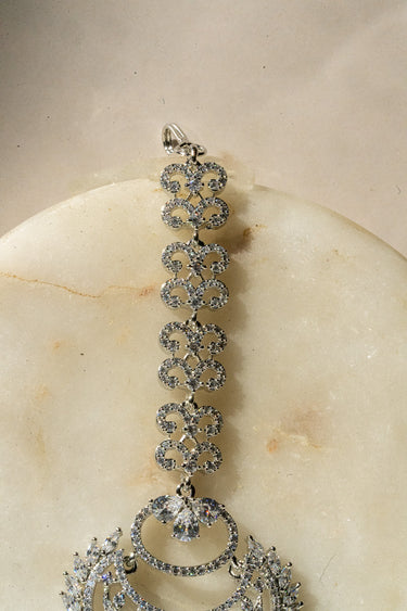Detailed view of Liza Rhodium AD Maang Tikka’s upper chain with circular AD stone links, ideal for bridal or festive looks.