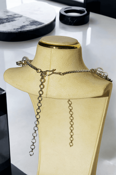 Back view of Mayesha Rhodium-Plated Pearl Necklace showing adjustable chain clasp for a customizable fit and secure wear.