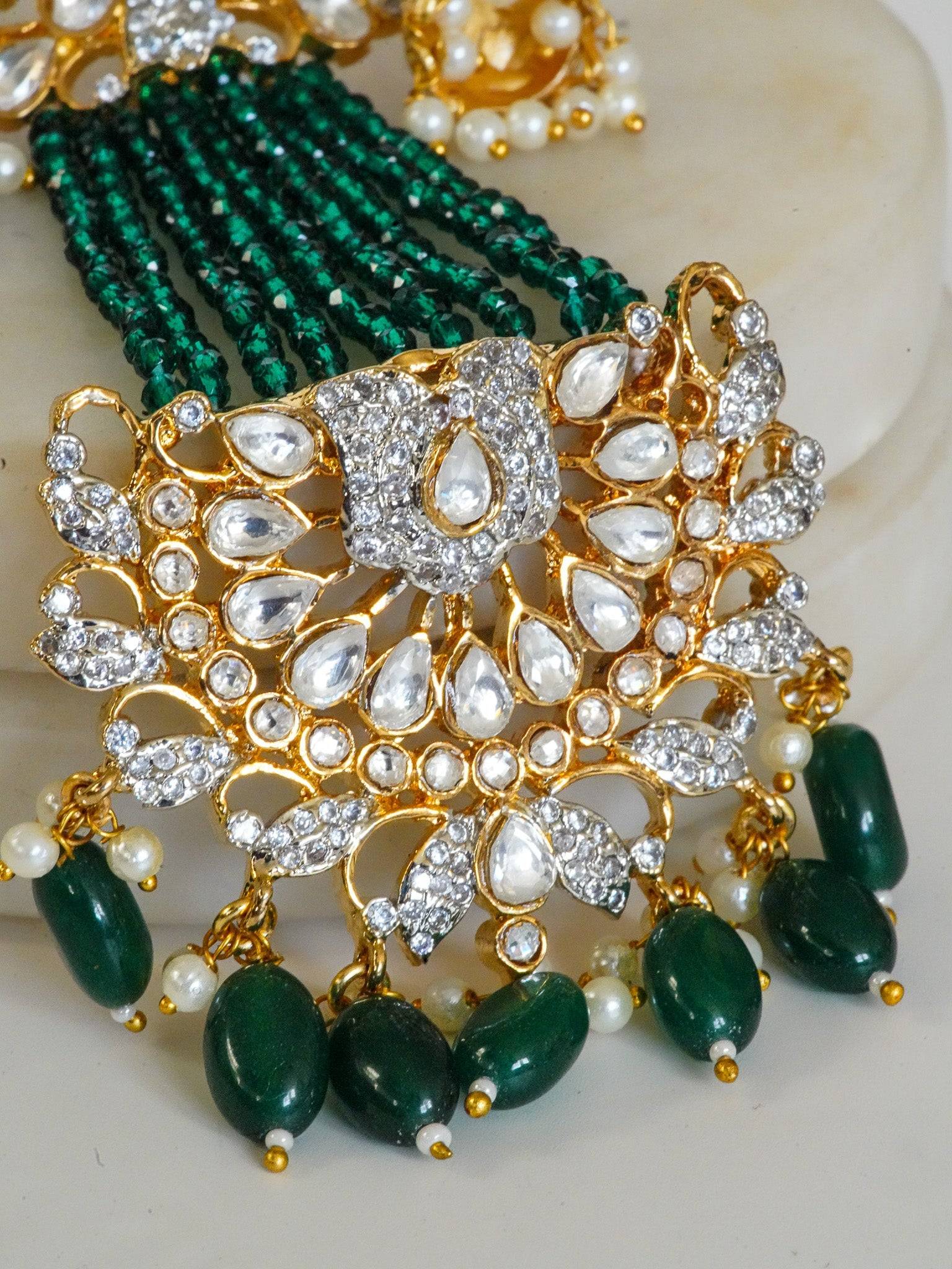 Meenu Chandelier Earrings - Gold plated with green beads, authentic Moissanite Polki, and white Diamante AD stones, featuring mini jhumkas and intricate design.