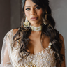 Mona Pearl Moissanite Polki Choker Set – Indian Jewelry featuring layered pearl strands, central floral moissanite polki motif, and gold accents.