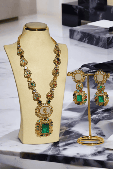 Monika Semi-Precious Gold Plated Mala Necklace Set - Multi-color stones with faux pearls and Moissanite Polki detailing, available with hot pink, light pink, or green center stones, and matching 2.6-inch statement earrings.