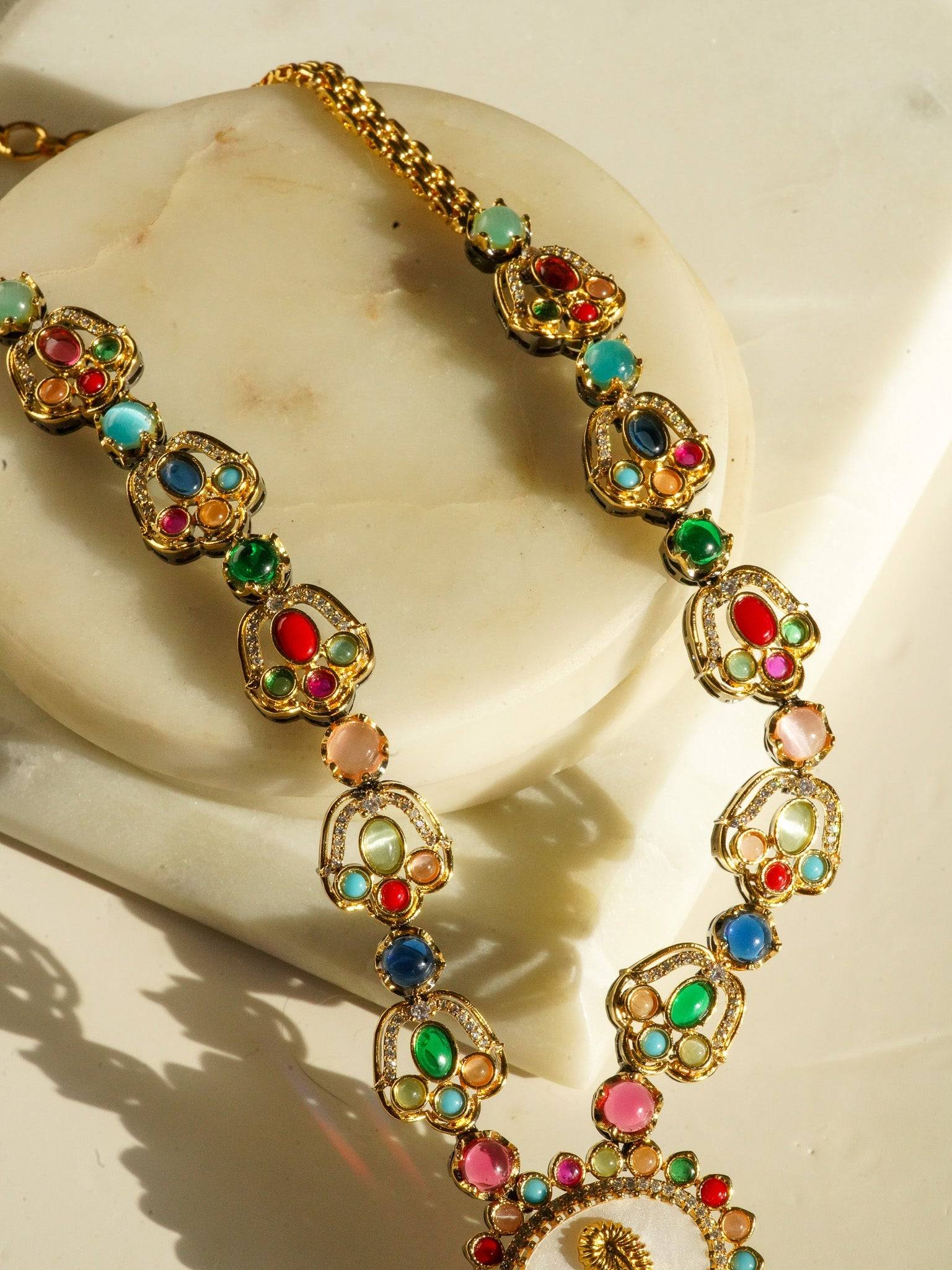 Monika Semi-Precious Gold Plated Mala Necklace Set - Multi-color stones with faux pearls and Moissanite Polki detailing, available with hot pink, light pink, or green center stones, and matching 2.6-inch statement earrings.