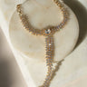 Nayla statement haathphool - hand chain bracelet in gold with ring