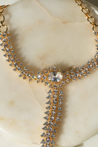 Nayla statement haathphool - hand chain bracelet in gold with ring