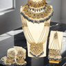 Nazanin Gold Plated Teal Bridal Set - 6-piece collection with gold plating, white zircon stones, teal blue beads, including jhumka earrings, choker, classic necklace, long necklace, jhoomer, and maang tikka.