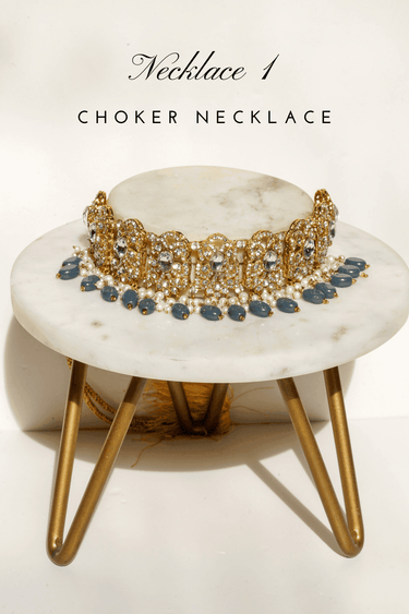 Nazanin Gold Plated Teal Bridal Set - 6-piece collection with gold plating, white zircon stones, teal blue beads, including jhumka earrings, choker, classic necklace, long necklace, jhoomer, and maang tikka.