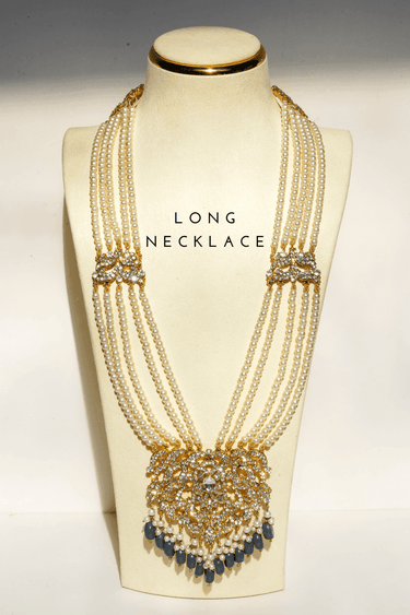 Nazanin Gold Plated Teal Bridal Set - 6-piece collection with gold plating, white zircon stones, teal blue beads, including jhumka earrings, choker, classic necklace, long necklace, jhoomer, and maang tikka.
