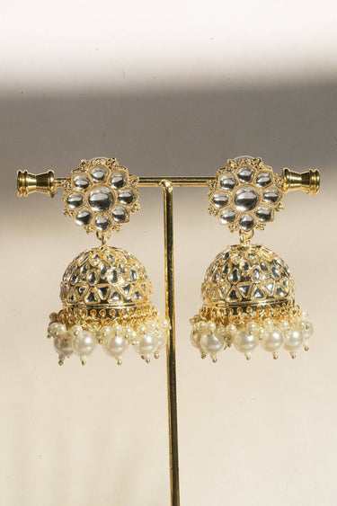 Neeshy champagne gold plated choker necklace set with resin bead detailing , paired with jhumka earrings and maang tikka from Inaury