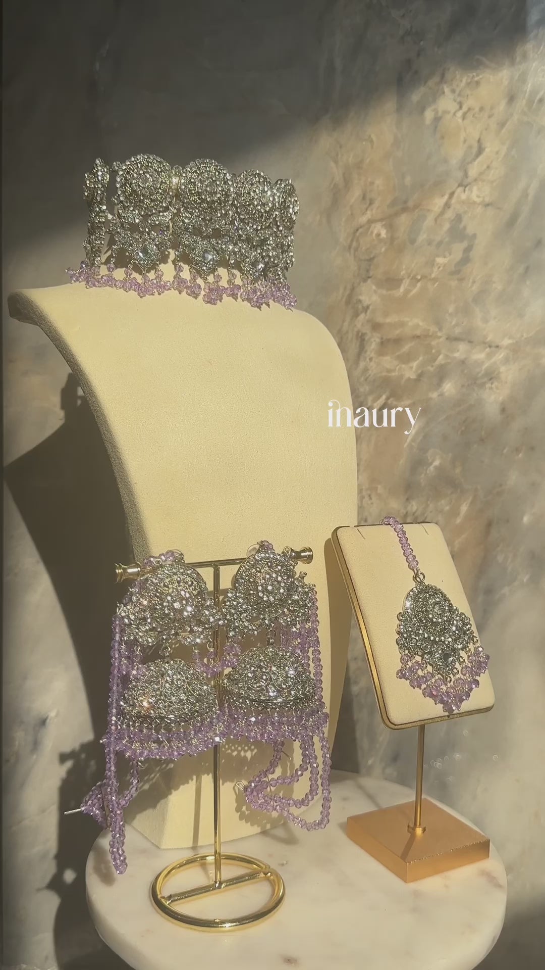 Silver Namar Choker Necklace Set with lavender beads displayed on a stand, highlighting intricate CZ detailing.
