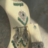 Noreen Choker Necklace Set - Elegant Pakistani Bridal Jewels in silver with green accents, featuring intricate detailing and matching accessories.