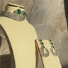 Mahi Asymmetrical Choker Necklace Set - Rhodium-plated with AD stones, available in silver & green, silver & ruby, and silver & sapphire blue, perfect for contemporary elegance.