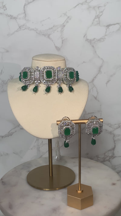 Jhanvi Choker Necklace Set - Silver & Gem Variations featuring cushion-cut AD stones with green teardrop accents, includes matching earrings.