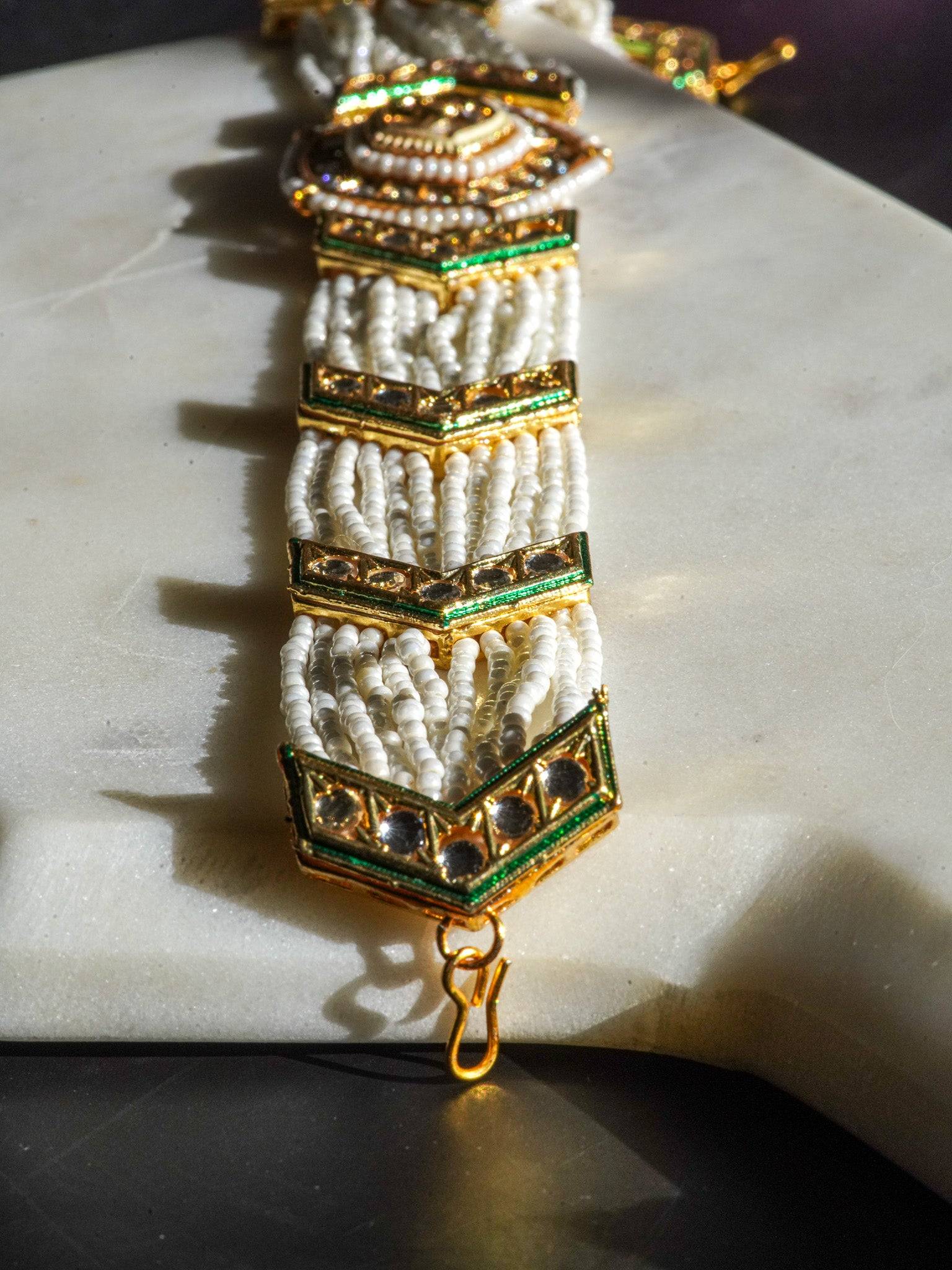 Gold moissanite polki mathapatti with ivory beading for Indian jewelry wear from Inaury