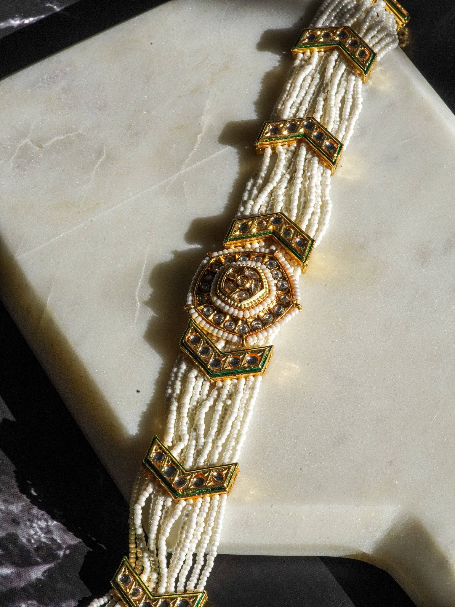 Gold moissanite polki mathapatti with ivory beading for Indian jewelry wear from Inaury