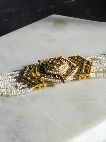 Gold moissanite polki mathapatti with ivory beading for Indian jewelry wear from Inaury
